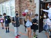 Hemlock School first graders and kindergarteners walked through bright balloon arches and into a new school year. 