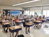 MaryAnn Gilroy’s sixth graders were glad to be back, even with masks and desk barriers.