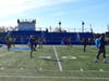 The Long Beach High School football team participates in fitness training drills. 