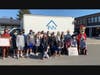 County Executive Laura Curran, pictured with students and staff members, attended the food drive at Garden City High School on Nov. 21. 