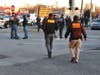 Nassau County police officers were at the Bellmore LIRR station on Saturday to peacefully break up dueling protests.