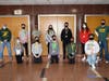 Adam Nislow, a Grand Avenue counselor, with students Jake Wilson, Kristen O’Hallaran, Xavier Sutherland, Sierra Barbosa, Ellie Meyer, Jayden Simon, Sebastian Fu, Clairevy Maingrette, Samantah Bremer, Luke Yepez and Assistant Principal James Mollica.