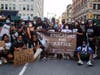 Five teachers from Excellence Boys Middle Academy used a day off to organize a protest through Brooklyn that attracted 5,000 marchers.