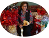 Holiday greenery with pre-fashioned bows are among the many offerings available at the Storrs Congregational-UCC Christmas bazaar Nov. 23 through Dec. 5