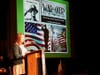 Catherine Hurlburt, a senior at Northwest Catholic, introduces the Veterans Day keynote speaker, Sgt. John Mastro, a NWC graduate from the Class of 1968.