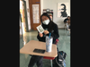 Charlene Lam shows off a Christmas card she signed during Mr. Paul Fitzpatrick’s advisory.