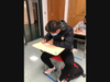Giovan Cuevas signs Christmas cards during Ms. Sara Avery’s advisory.