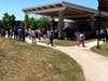The new band shell seats 250, but it was standing room only at the Completion Celebration.