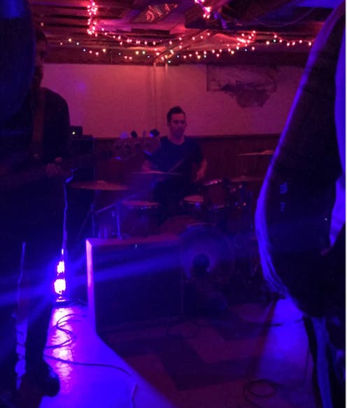 A band performs in a New Brunswick basement, via Katie Kausch