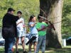 students using a bow and arrow