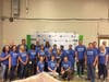 Volunteers gathered for a group shot while helping the Cleveland Food Bank. 