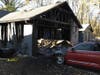 A fire tore through an attached garage at a Strongsville home on Sunday. 