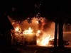 A fire tore through an attached garage at a Strongsville home on Sunday. 