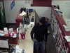 Police said a group of men stole narcotics and cash from a pharmacy in Cleveland. They hit one of the employees in the head with a gun.