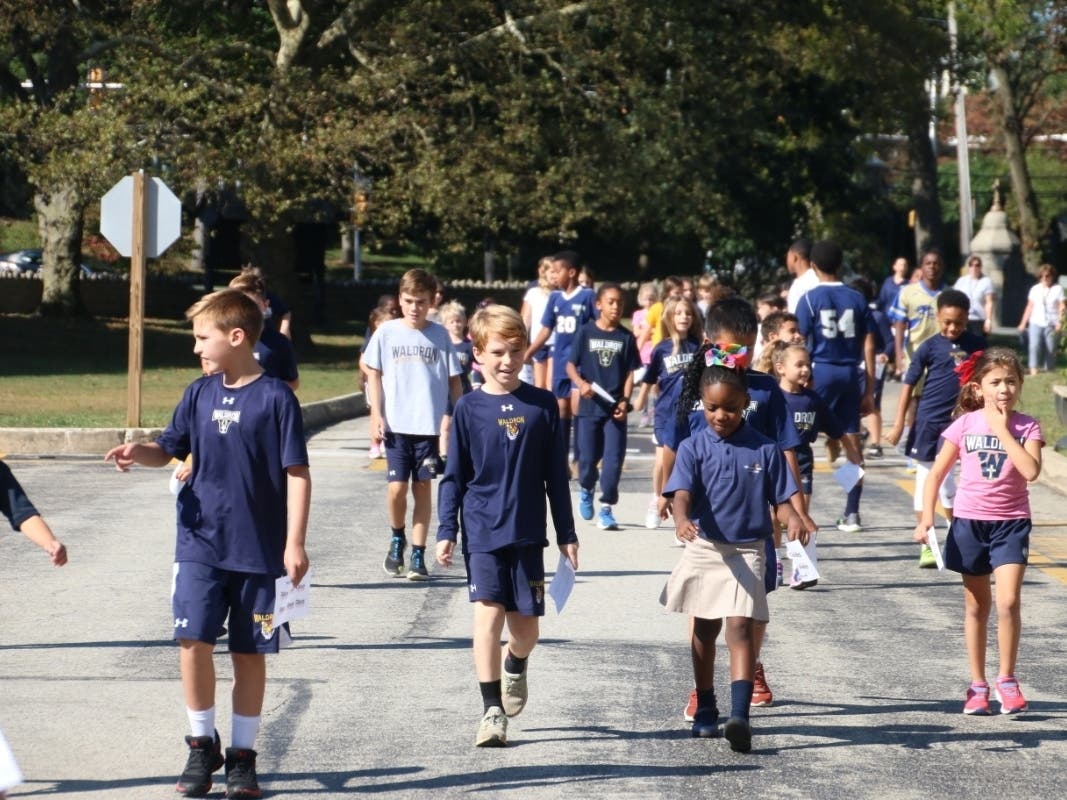 Waldron Mercy Academy students walk to raise money to feed the hungry around the world.