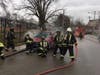 Firefighters from the Merion Fire Company of Ardmore battle a car fire Friday morning.