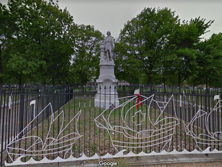 Armed men gathered at the Christopher Columbus statue in South Philadelphia's Marconi Plaza.