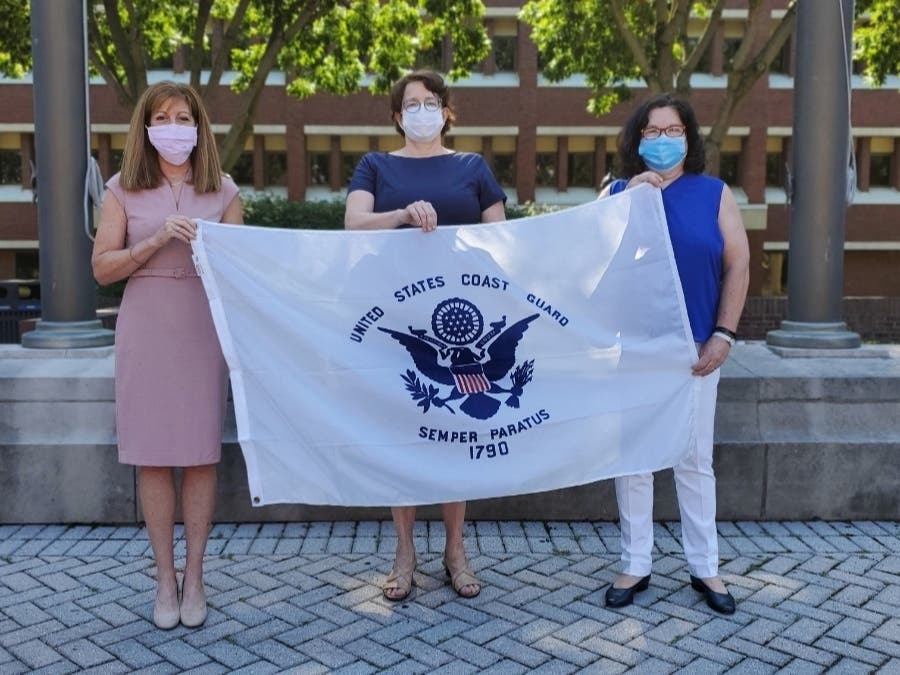 Delaware County Council members Elaine Paul Schaefer and Christine Reuther as well as County Controller Joanne Phillips raised the U.S. Coast Guard Flag Tuesday.