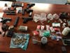 Pictured is a fraction of the drugs and guns seized by state and local authorities in West Philadelphia.