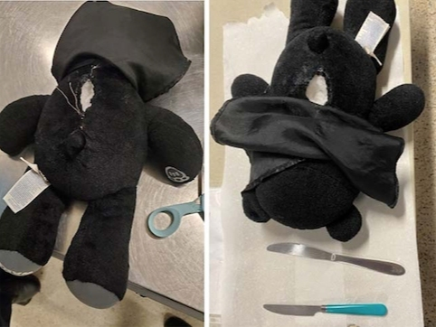 A stuffed animal that was stuffed with two knives. TSA officers removed these two knives from the back of the stuffed animal at a security checkpoint at Philadelphia International Airport.