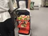 The "Matradee" has designated tiers to hold trays of food for delivery to residents.