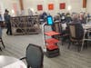 The "Matradee" has designated tiers to hold trays of food for delivery to residents.