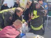 Merion Fire Company of Ardmore firefighters cut a chair that a young girl's finger was caught in.