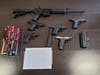 During the searches, authorities seized 29 firearms, including three assault rifles; 2,489 grams, or 82,966 doses, of heroin/fentanyl; 47 grams of meth; and $179,000 in cash.