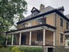 Norris Childs even has bee boxes on the roof of the porch at his Germantown home.