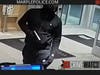 The suspect was described as a black man, tall and thin, wearing all black clothes and a black ski mask.