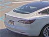 The white Tesla seen here was stolen and used in thefts in Haverford Township recently, police said.