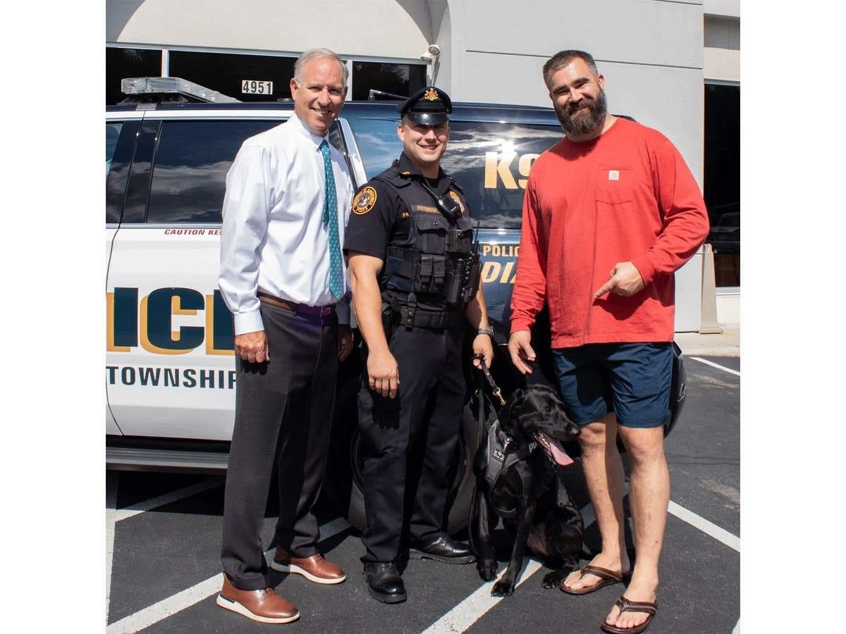 Steve Videon, of Videon Chrysler, Dodge, Jeep & Ram, Officer Anthony Patterson, K-9 Winnie, and Jason Kelce.