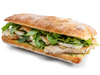 The new Chicken Pesto Sandwich features chicken breast on a ciabatta roll with basil pesto, melted fresh mozzarella cheese, and arugula.