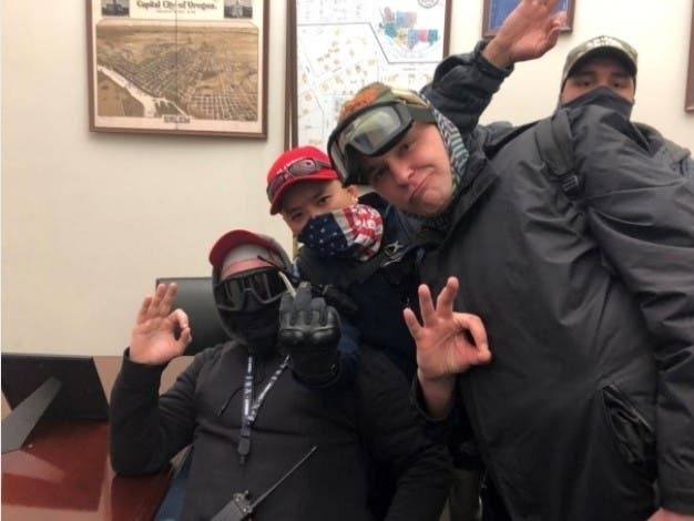 Authorities said that (from left) Brian Healion, Freedom Vy, Zach Rehl, and Isaiah Giddings were inside the U.S. Capitol Building on Jan. 6, 2021.