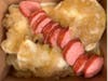 Kielbasa Special — Six traditional potato and cheese pierogies topped with slow-cooked caramelized onions, Dietz & Watson Polska Kielbasa, and a side sour cream. Find it at The Pierogie Place in Section 134.