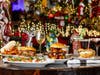For food at Craftsman Row Saloon's Holiday Wonderland Christmas Pop-up, look for the Christmas Dinner Burger​, Turkey BLT​, Candy Cane Caprese​, and Festive Salad.