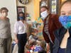 Delivery at the Community Resource Center. Pictured left to right: Ann Sheridan, Zsuzsanna Baan-Jonas, Jirandy Martinez, Sarah Anna Jonas.