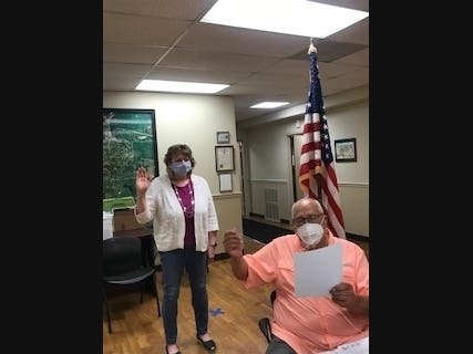 Township Supervisor Steve Rosendahl "safely" swearing in Debby Blatzer at June 9th Township meeting.