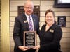 MxCC CEO Steve Minkler and MxCC Foundation Board Chair Laura Krueger ’89 announce the Legacy Award recipient, Jesse Salafia 