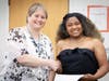 Interim Campus CEO Kim Hogan congratulates Tina Muniz-Jones who received the MILE Scholarship