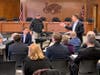 Councilman Tom Bullock leads a multi-city forum at city hall on ways to lower energy costs to residents through energy efficiency and clean power.