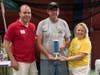 [Kristine Quinby, Potential Inc.'s  founder, president and CEO, awards trophies at the 2018 Car Show]