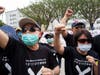 Protesters express their outrage over the Taiwan government’s human rights abuses in front of the enforcement agency in Miao-Li, Taiwan on August 21, 2020.