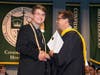 Salutatorian Robert Damjanovich, of Seymour, with Notre Dame High School of West Haven President Robert F. Curis.