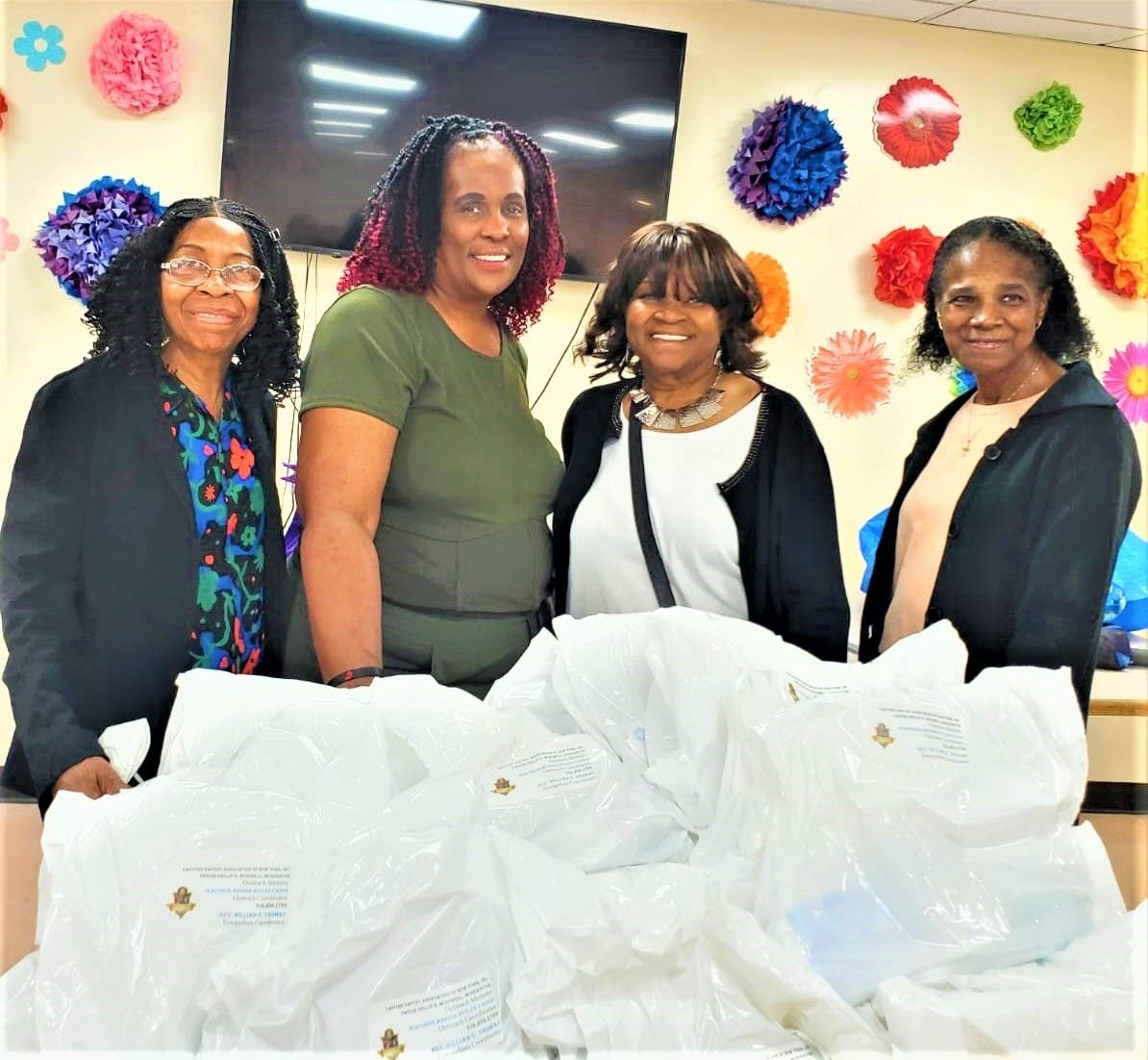The women from Shiloh Baptist Church with the bags of Father's Day gifts for Concord's residents.  