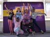 Girls during the dance clinic from Ethel Walker’s National Girls and Women in Sports Day strike a pose in front of Walker’s sign.