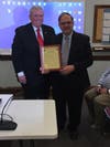 John Halsey presented a certificate to Dan Ensminger.