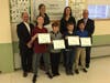 Flanked by Toshiba's Mark Di Perri and School Superintendent Jon Bernard, the Regional winners showed off their awards.