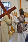 Gabriel Jeha as Jesus and Anna Fringuelli as Veronica wiping Jesus' face.