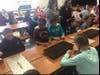 Joshua Eaton 5th grader plating day with principal Lisa Marie Ippolito and Karleen Sayman as well as 5th grade students.